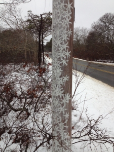 winter: the last in a series of mysterious telephone pole art installations.
